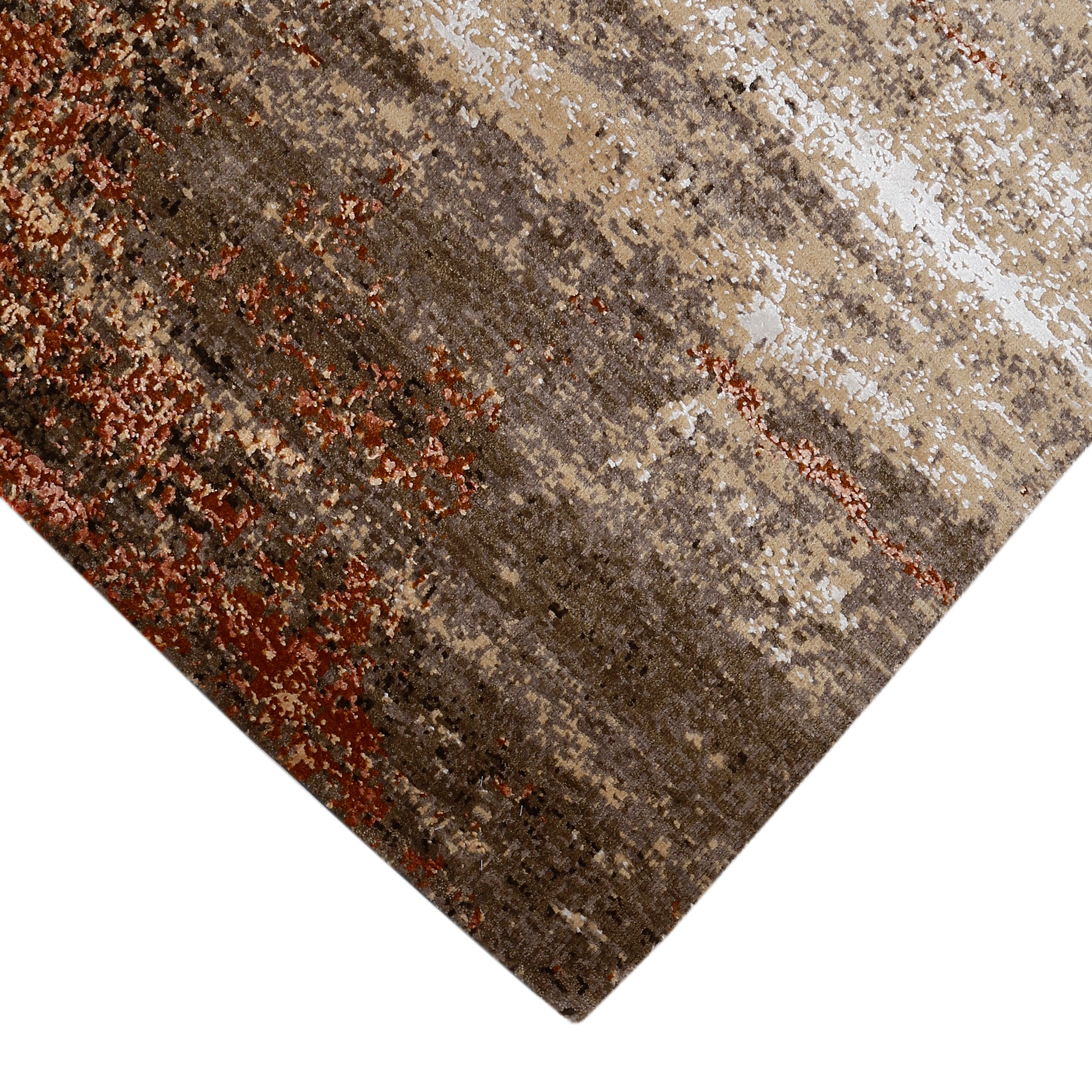 Hand-finished edge and textured abstract surface of the Rust Horizon hand knotted modern rug
