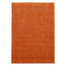 Full view of rust orange Hand Woven Loom Lori wool rug with multicolour floral motifs and subtle geometric border