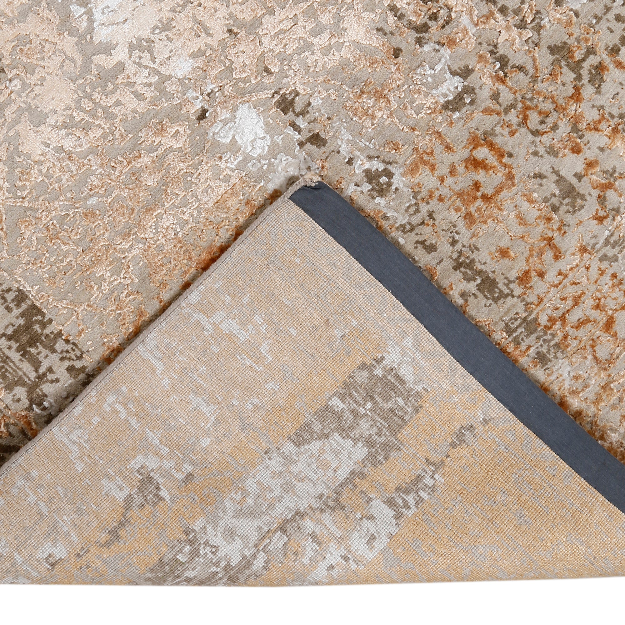 Hand-finished edge and faded ornamental detailing of the sandstone rust hand knotted rug