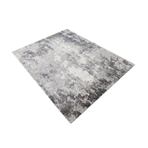 Silver ash abstract hand knotted wool and viscose rug with grey ivory charcoal and taupe textured detailing1