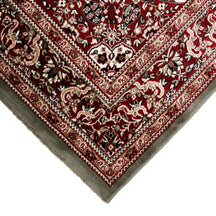 Corner and edge detail of Silver Grey Floral Medallion Machine Woven Classic Art Silk Rug with red ornamental border