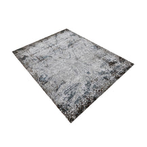 Silver slate distressed hand knotted wool and viscose rug with grey ivory blue and brown ornamental detailing