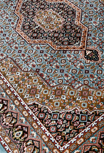 Close-up texture of Sky Blue Machine Woven Classic Art Silk Rug showing geometric motifs and smooth Art Silk surface