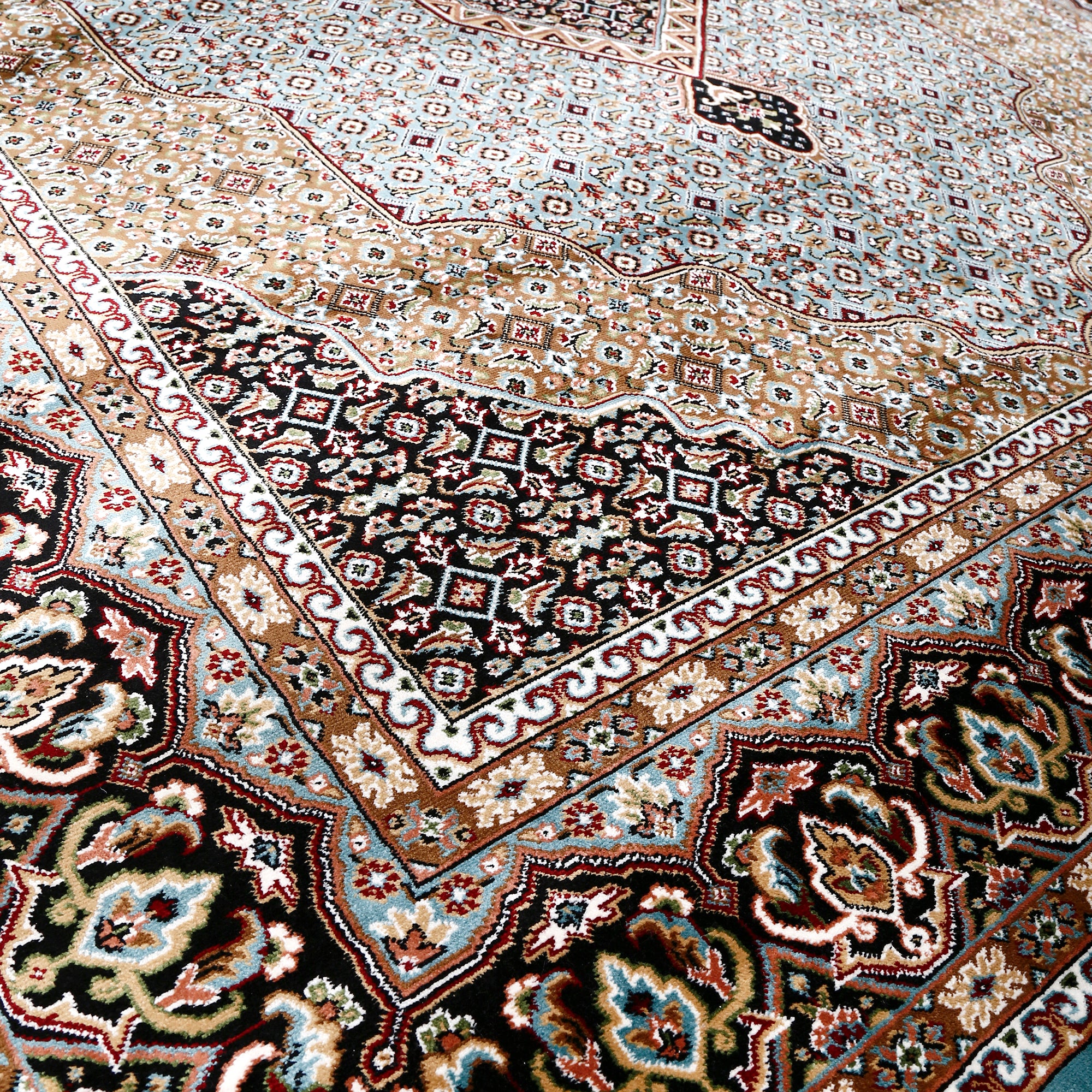 Close-up texture of Sky Blue Machine Woven Classic Art Silk Rug showing geometric motifs and smooth Art Silk surface