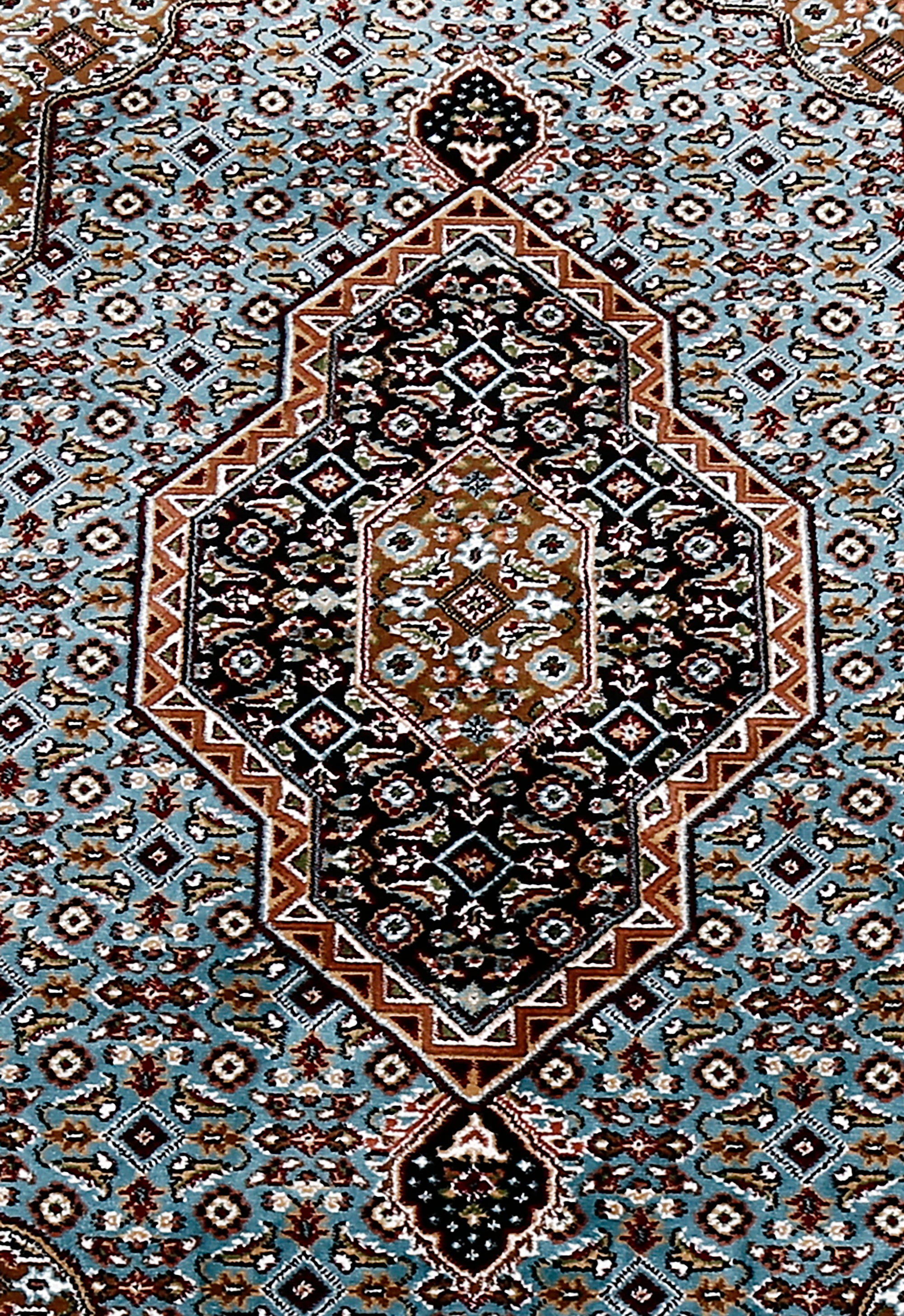 Close-up texture of Sky Blue Machine Woven Classic Art Silk Rug showing geometric motifs and smooth Art Silk surface