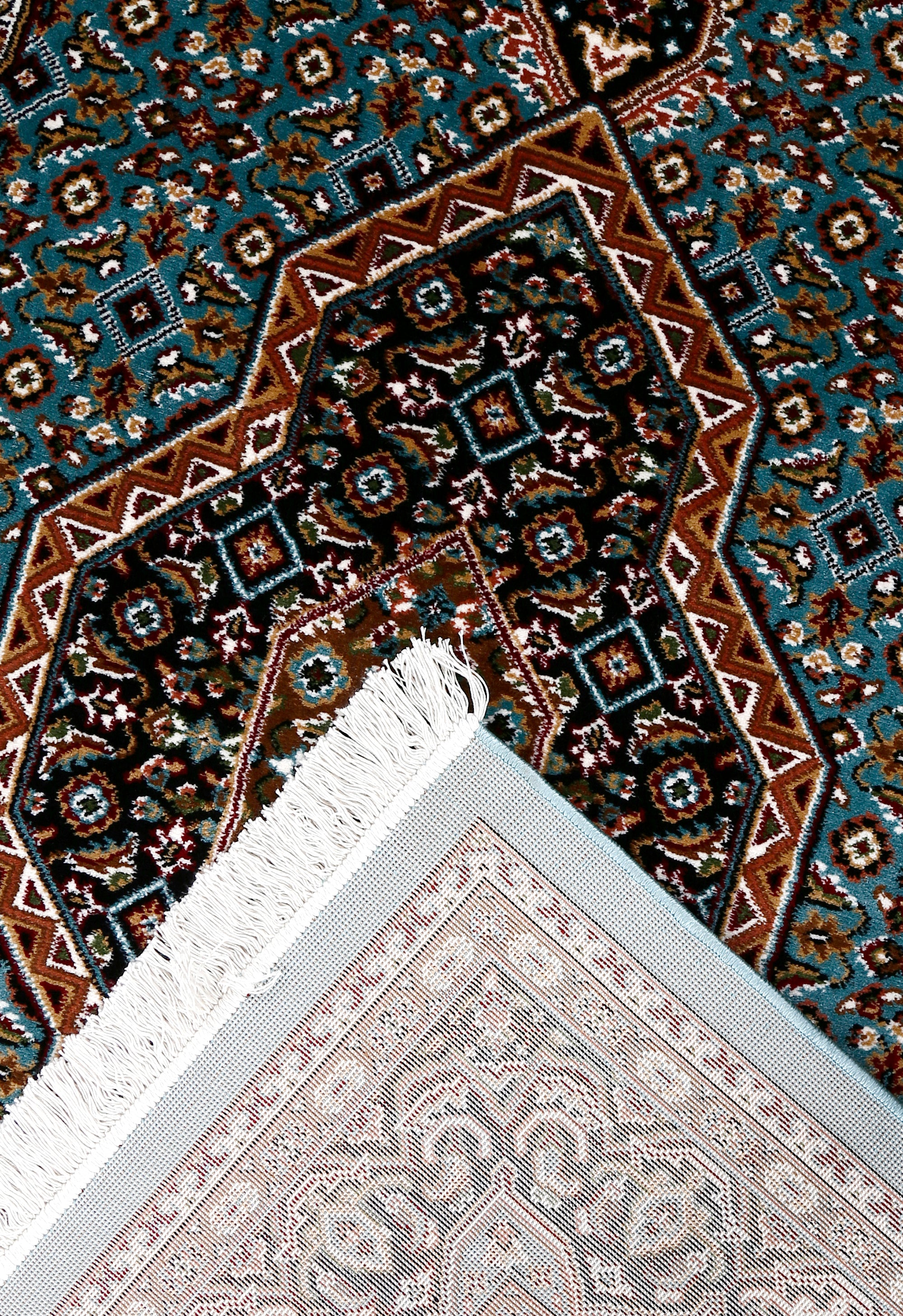 Corner and fringed edge detail of Sky Blue Geometric Medallion Machine Woven Classic Art Silk Rug