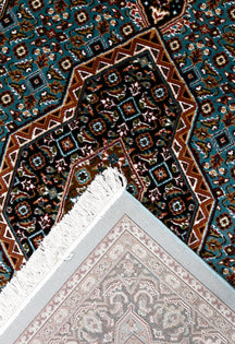 Corner and fringed edge detail of Sky Blue Geometric Medallion Machine Woven Classic Art Silk Rug