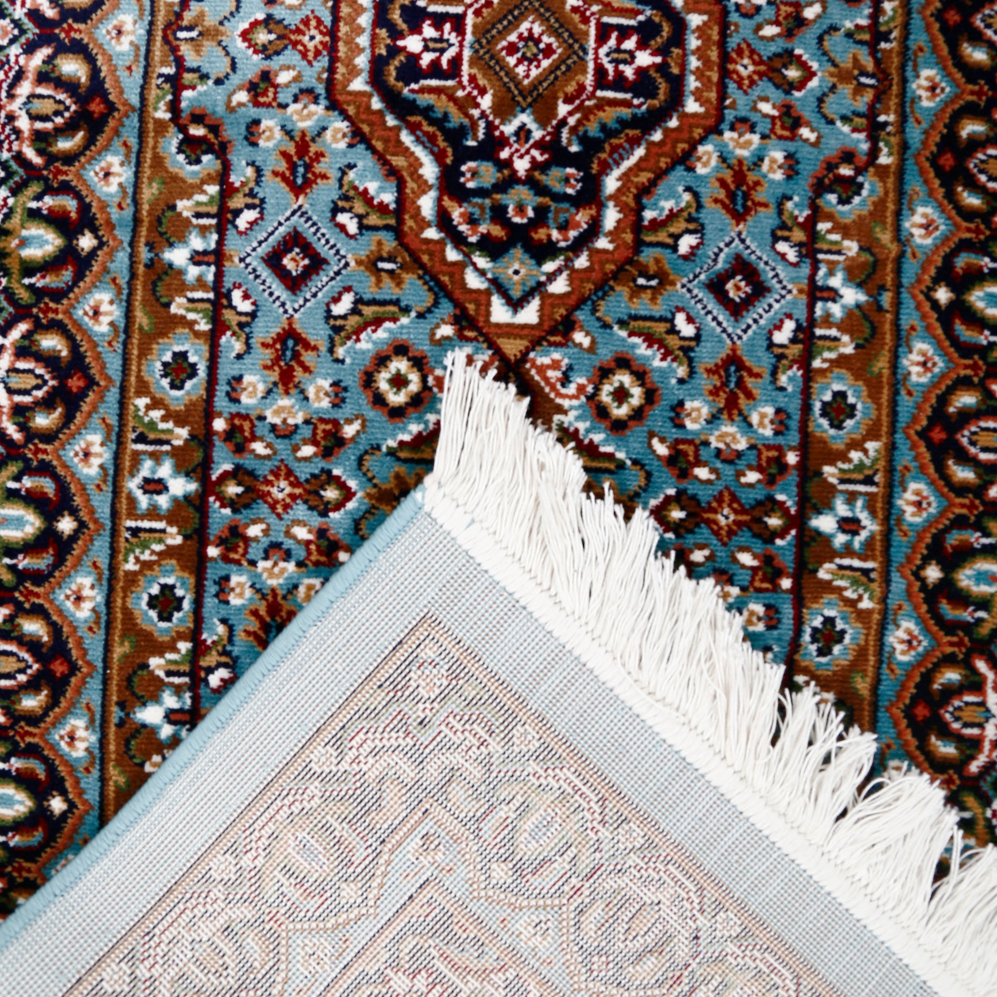 Corner and fringed edge detail of Sky Blue Triple Medallion Machine Woven Classic Art Silk Runner Rug