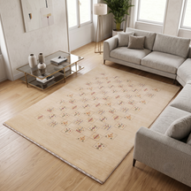 Warm beige Hand Woven Loom Lori wool rug with central multicolour tribal geometric grid motifs styled in a neutral living room